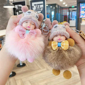 Vente en gros de poupées bébé mignonnes et kawaii, livraison directe, poupée bébé endormie, porte-clés pour femmes, breloque de sac, porte-clés en peluche pompon - Product Image 3