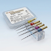Limes rotatives endodontiques Niti Super Silver élastiques à conicité multiple, activées par la chaleur, en nickel-titane pour le traitement des canaux radiculaires dentaires