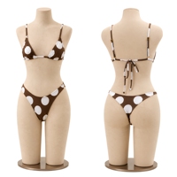 Hoogwaardige, milieuvriendelijke, op maat gemaakte bikini met polkadotdesign, verstelbare bandjes en hoge snit voor dames.