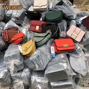 2023 WEIBILI ropa de <span class=keywords><strong>segunda</strong></span> <span class=keywords><strong>mano</strong></span> bolsa usada pacas mujeres diseñadores bolsos de hombro Uesd señoras bolsa ropa usada - Product Image 1