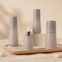 Ensemble d'emballages de soins de la peau Mingdun 45/65/110/150/180ml Premium pour kit facial éclaircissant et anti-âge au curcuma, flacon et pot de lotion
