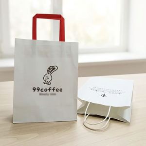 ถุงกระดาษคราฟท์สีขาวและสีน้ำตาลหูหิ้วแบบบิด สำหรับใส่สินค้า พร้อมโลโก้ธุรกิจตามสั่ง - Product Image 1