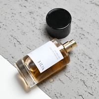 Nouvelle conception de flacon de parfum à bouchon à pression de 30 ml, 50 ml, 100 ml, flacon de parfum rond en verre avec bouchon noir