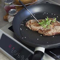 Table de cuisson à induction domestique en acier inoxydable durable avec contrôle précis de la température