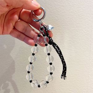 Chaîne de téléphone en corde de nylon avec perles acryliques transparentes, plaqué argent, motif cœur, pour cadeau de bijoux mignon, vente en gros - Product Image 5