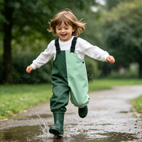 Salopette de pluie imperméable pour enfants en PU, couleur verte, avec bretelles réglables et chevilles élastiques, pour l'extérieur, écologique, OEM