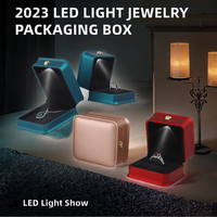 Boîte d'emballage rigide pour bijoux avec éclairage LED, nouveau design 2023, recyclable, forme personnalisable, vernie, gaufrée, imprimée pour colliers