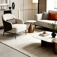 Table d'appoint de luxe à surface ronde en marbre et base en acier, style italien minimaliste et élégant pour villa