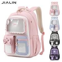 Sac à dos scolaire imperméable en tissu Oxford avec poches à nœuds pour les filles du collège en rose ou violet