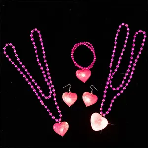 Love Glow collare con cuore di pesca orecchini a LED orecchini a goccia Punk Hip Hop incandescente perlina a cuore di pesca bracciale di illuminazione