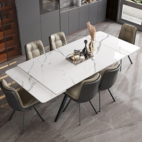 Table à manger extensible moderne italienne en pierre frittée, plateau en porcelaine aspect marbre blanc, table de cuisine avec base en métal