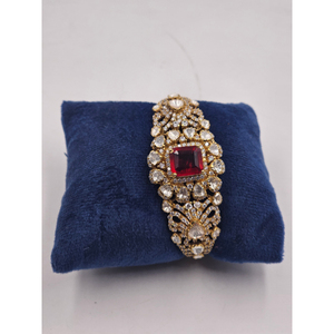 gold-plated brass cuff <b>bracelet</b> features central square <b>ruby</b> doublet surrounded intricate floral-patterned polki crystals SET - Product Image 1