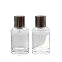 Flacon de parfum cylindrique transparent de 50 ml en verre, sérigraphié, rechargeable, vaporisateur vide, emballage de luxe pour parfum, direct usine