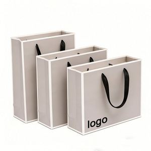 High Strength Custom Logo Printed Luxury Fashion Retail Gift Packaging Eco Reusable Rope Handle <b>Paper</b> Bag - Product Image 2