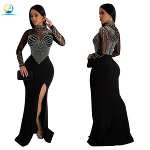 Robe de soirée à col rond et à manches longues avec fente haute pour femmes Robe de soirée de couleur unie - Product Image 1