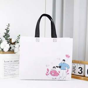 Achetez des sacs à main en tissu non tissé de taille moyenne personnalisables et des sacs cadeaux pliables - Product Image 1