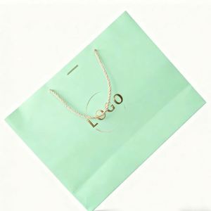 High-End Custom Design Eco-Friendly Laminated Gold Foil Printed <b>Gift</b> Packaging Beauty Colorful Paper <b>Bag</b> with Rope - Product Image 1