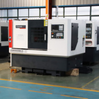 Tour CNC à banc incliné de haute précision TCK6340S avec tourelle servo à 8 postes et rangée de couteaux - Usage moyen