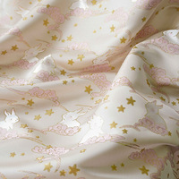 Nouveau et tendance : Tissu jacquard brodé 100 % polyester avec fil doré, motif lapin en satin, pour vêtements et sacs pour enfants