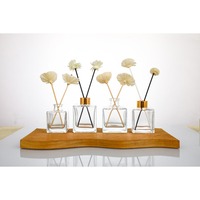 Diffuseur d'ambiance en verre carré personnalisé de 50 ml, 100 ml, 150 ml, 200 ml avec bâtonnets parfumés en fibre pour intérieur