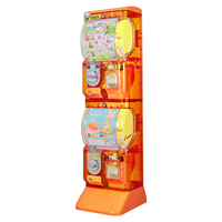 Distributeur automatique de capsules transparentes orange avec système de paiement par jetons, capacité de 100 à 300 unités, 15 kg, pour la vente au détail