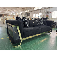Canapé carré italien minimaliste de luxe confortable et durable en tissu velours noir avec pieds en acier inoxydable et accoudoirs pour salon