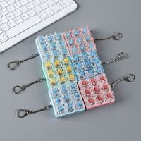 Claviers transparents en PC de différentes couleurs macaron, 9 trous, jouets anti-stress, décompression, interrupteur cyan