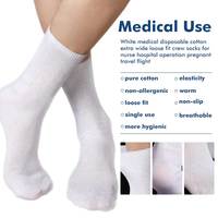 Chaussettes d'équipage à coupe ample extra larges en coton jetable médical blanc pour le vol de voyage enceinte d'opération d'hôpital d'infirmière
