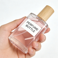 Flacon de parfum en verre transparent élégant de 50 ml avec capuchon pulvérisateur et marquage à chaud, vente en gros d'usine, haute qualité
