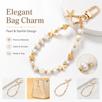 Porte-clés étoile de mer en alliage de zinc fait main avec perle, breloque de sac, pendentif, accessoire de sac à main, ornement suspendu, cadeau pour femme, prêt à expédier