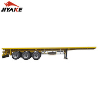 Semi-remorque plateau JIYAKE 50 tonnes 40 pieds 13m 3 essieux économique pour le transport d'équipements de construction en Chine
