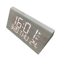 Horloge numérique à double alarme Design créatif en bois Chargement USB Température Calendrier Affichage pour bureaux Tables Mouvement électronique