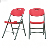 Chaise pliante commerciale avec poignée intégrée, assise moulée par soufflage, gris foncé, structure en acier, mobilier événementiel