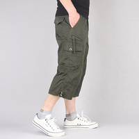 Shorts mi-longs pour hommes, motif uni, fermeture éclair, coupe ample, multi-poches, shorts décontractés, shorts de plage, shorts cargo pour hommes, shorts de sport