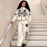 Ensemble de veste et pantalon de survêtement en nylon brodé pour fabricants, style streetwear coupe-vent