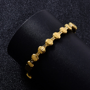 textured seashell motif wholesale 18k gold stainless steel subtle <b>crystal</b> scratch resistant elegant versatile bangle <b>bracelet</b> - Product Image 1
