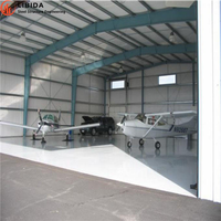 Hangar d'atelier préfabriqué en acier insonorisé pour avions, avec structure en treillis d'acier renforcé robuste et intelligente, 35x65 pieds