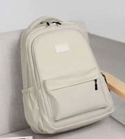 Sacs d'école de luxe multicouches de couleur noire de style nouveau 2025 pour adolescents de 14 ans pour garçons Classe