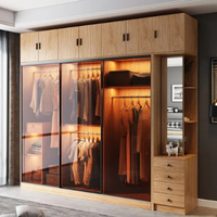 Armoire de luxe légère avec portes coulissantes en verre, meuble de chambre à coucher au design moderne, penderie coulissante avec portes vitrées