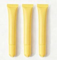Tuyau souple en plastique extrudé pour huile à lèvres, transparent laiteux givré, avec embout biseauté et bouchon, contenant vide pour brillant à lèvres, en vrac