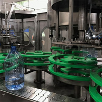 Machine de remplissage et de bouchage automatique d'eau minérale 3 en 1, ligne de production monobloc pour le lavage, le rinçage et l'étiquetage des bouteilles en PET