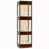 Vitrine à bijoux sur pied GZowin à 3 niveaux en verre avec éclairage LED, écologique, durable, couleurs personnalisables, pour colliers et bagues