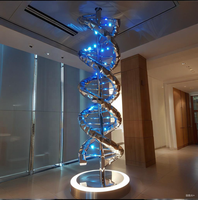 Sculpture en acier inoxydable poli sur mesure, thème double hélice de l'ADN, découpe laser, interprétation de la lumière et des ombres, code