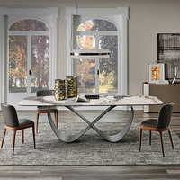 Table à manger dorée et dorée en forme de papillon, sur mesure, luxueuse, en pierre frittée