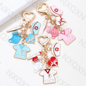 Phim Hoạt Hình Trái Tim Men <span class=keywords><strong>Keychain</strong></span> Handmade Kim Loại Nhiệt Kế Và Viên Nang Y Tá Hat Và Bác Sĩ Key Ring Set Quà Tặng Cho Phụ Nữ Và Nam Giới - Product Image 1