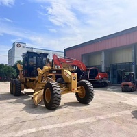 Niveleuse à moteur CAT 120H d'occasion, robuste, fiable et économe en carburant, avec moteur et pompe, pour l'entretien routier et le nivellement des chantiers