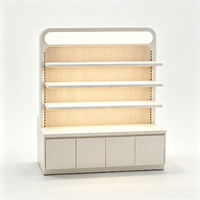 Étagère d'exposition moderne avec cadre arrondi et en-tête lumineuse pour magasin de cosmétiques, couleur personnalisable