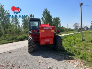 Offre Spéciale : Chargeur télescopique Manitou d'<span class=keywords><strong>occasion</strong></span> de 12 mètres et 3,5 tonnes avec fourches et <span class=keywords><strong>benne</strong></span> rotative - Product Image 3