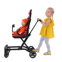 Poussette de voyage portable ultra compacte et légère pour bébé avec système de pliage confortable de taille cabine à grandes roues