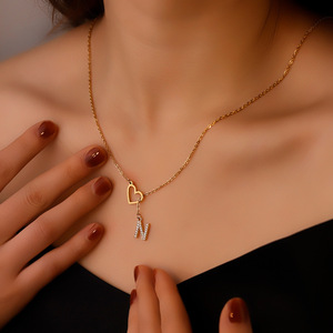 XL254 nuevo oro Color hueco corazón inicial colgante Acero inoxidable espiga cadena Collar para mujer - Product Image 1